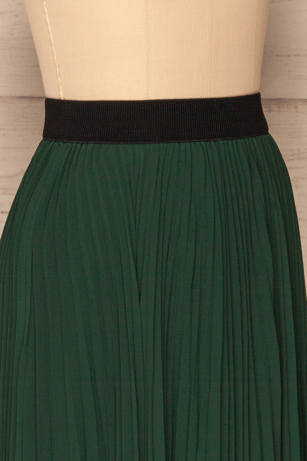 Kornik Pine Green Pleated Midi Skirt | SIDE CLOSE UP | La Petite Garçonne