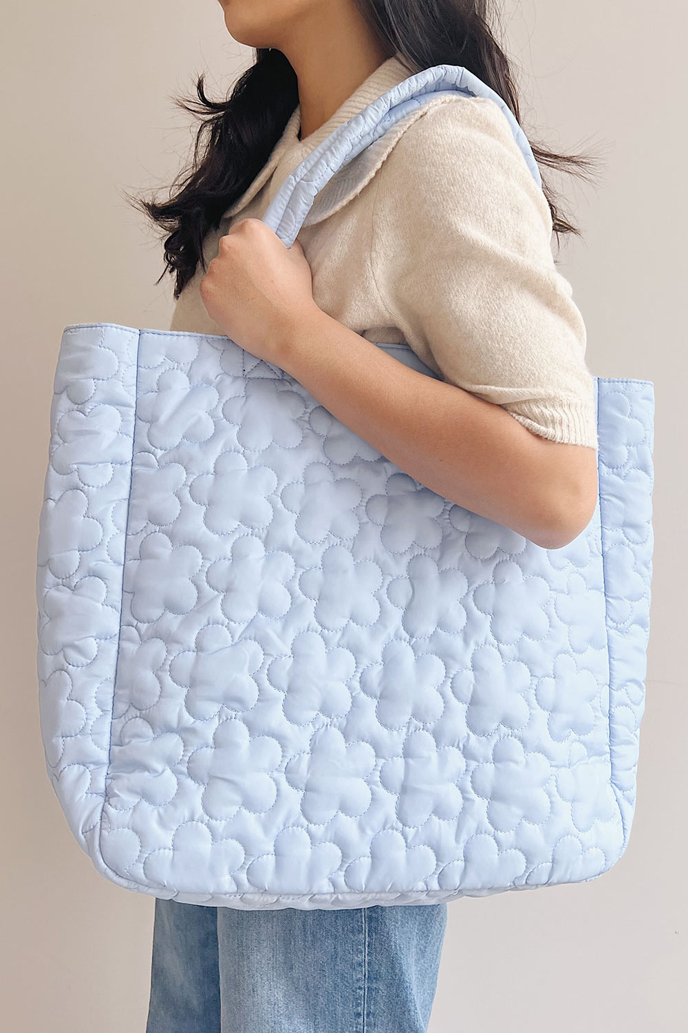 Maisie Blue Floral Quilted Bag | La petite garçonne on model