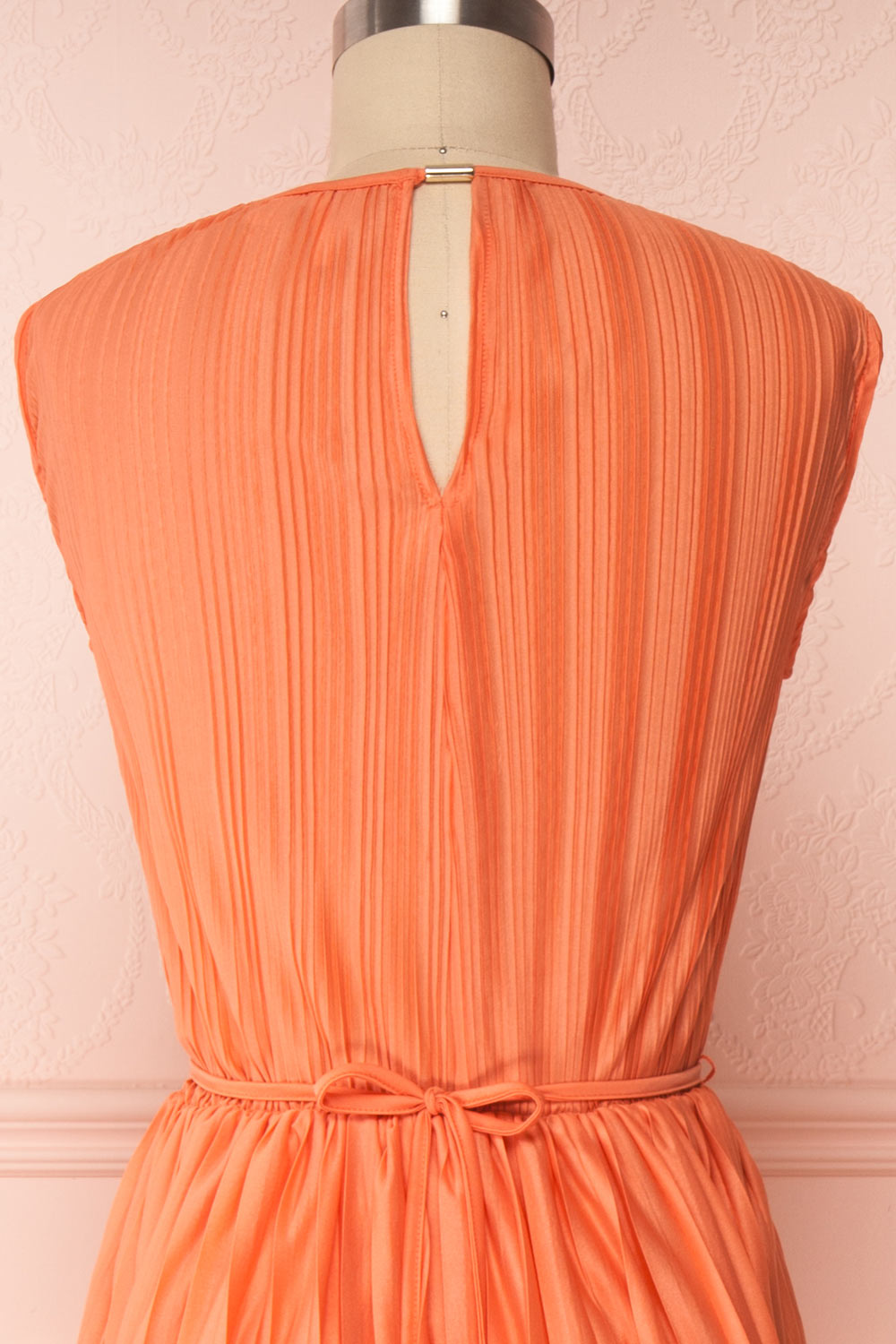 Ostra Petal Coral Pleated Midi Dress | Boutique 1861 back close up