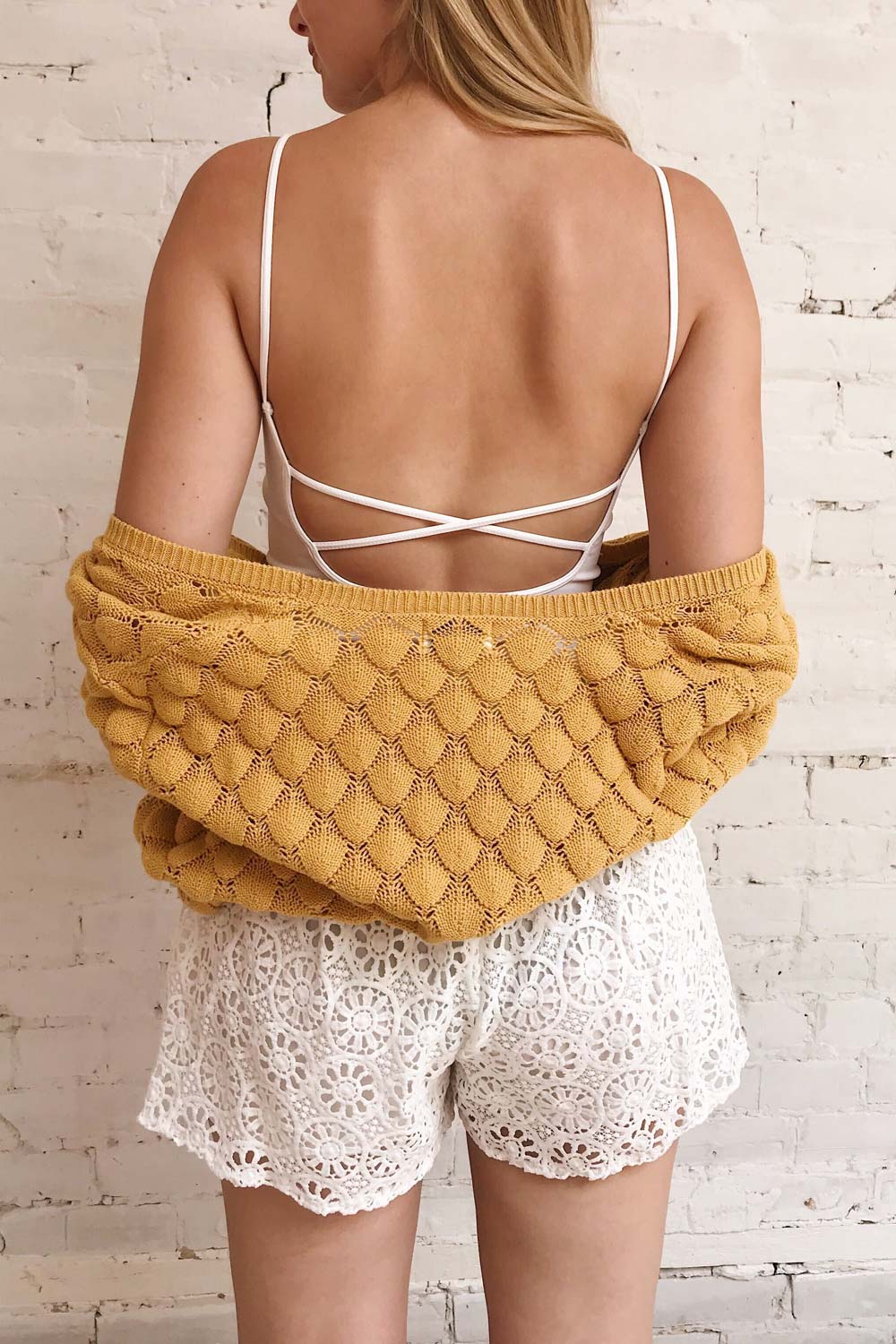 Qyppa White Fitted Crossed Back Crop Top | La petite garçonne on model