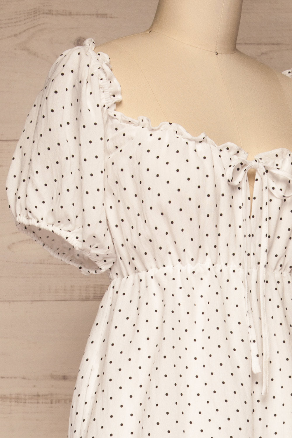 Rabka White Polka Dot Short Sleeve Romper | La petite garçonne side close-up