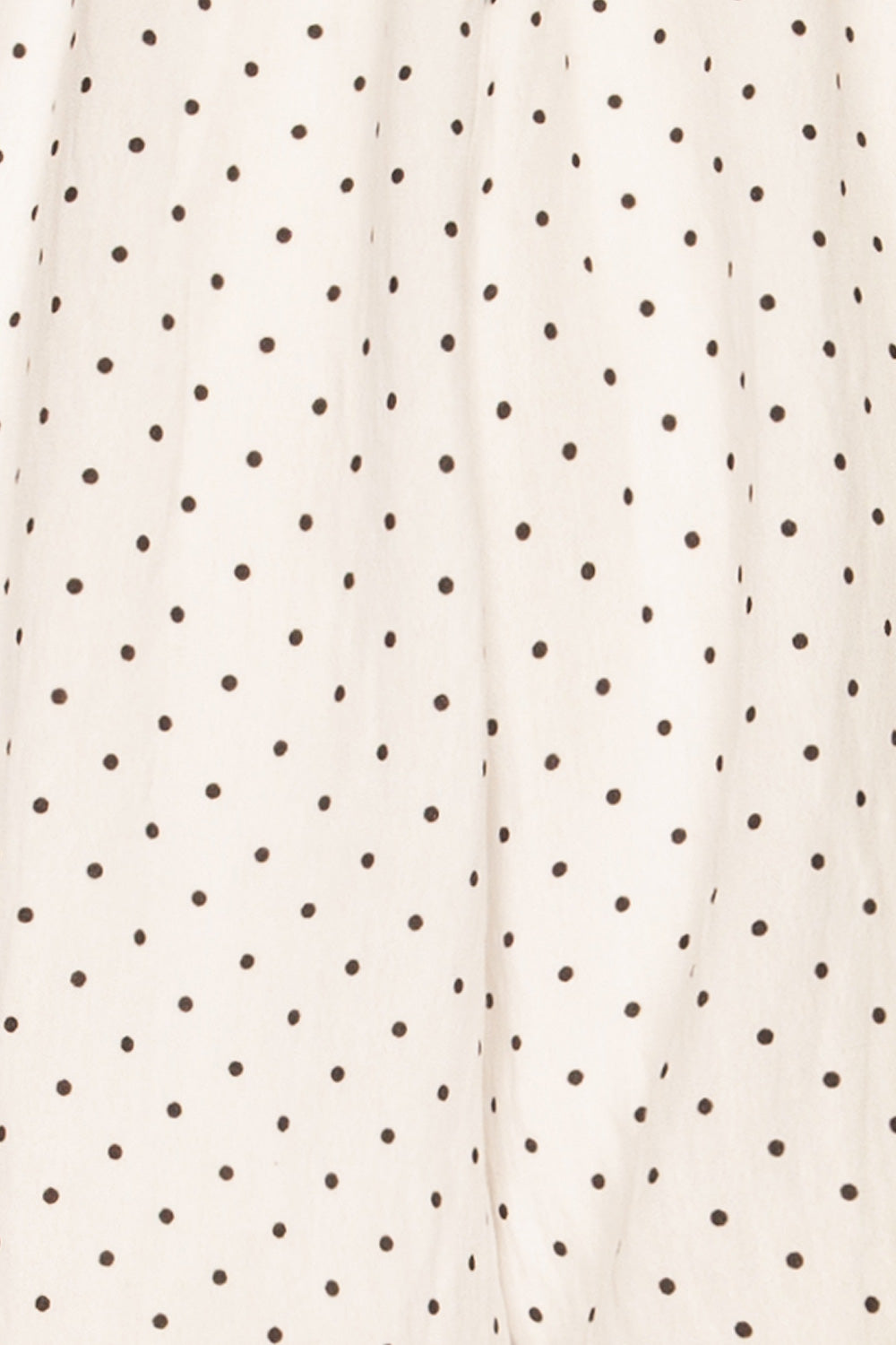 Rabka White Polka Dot Short Sleeve Romper | La petite garçonne fabric