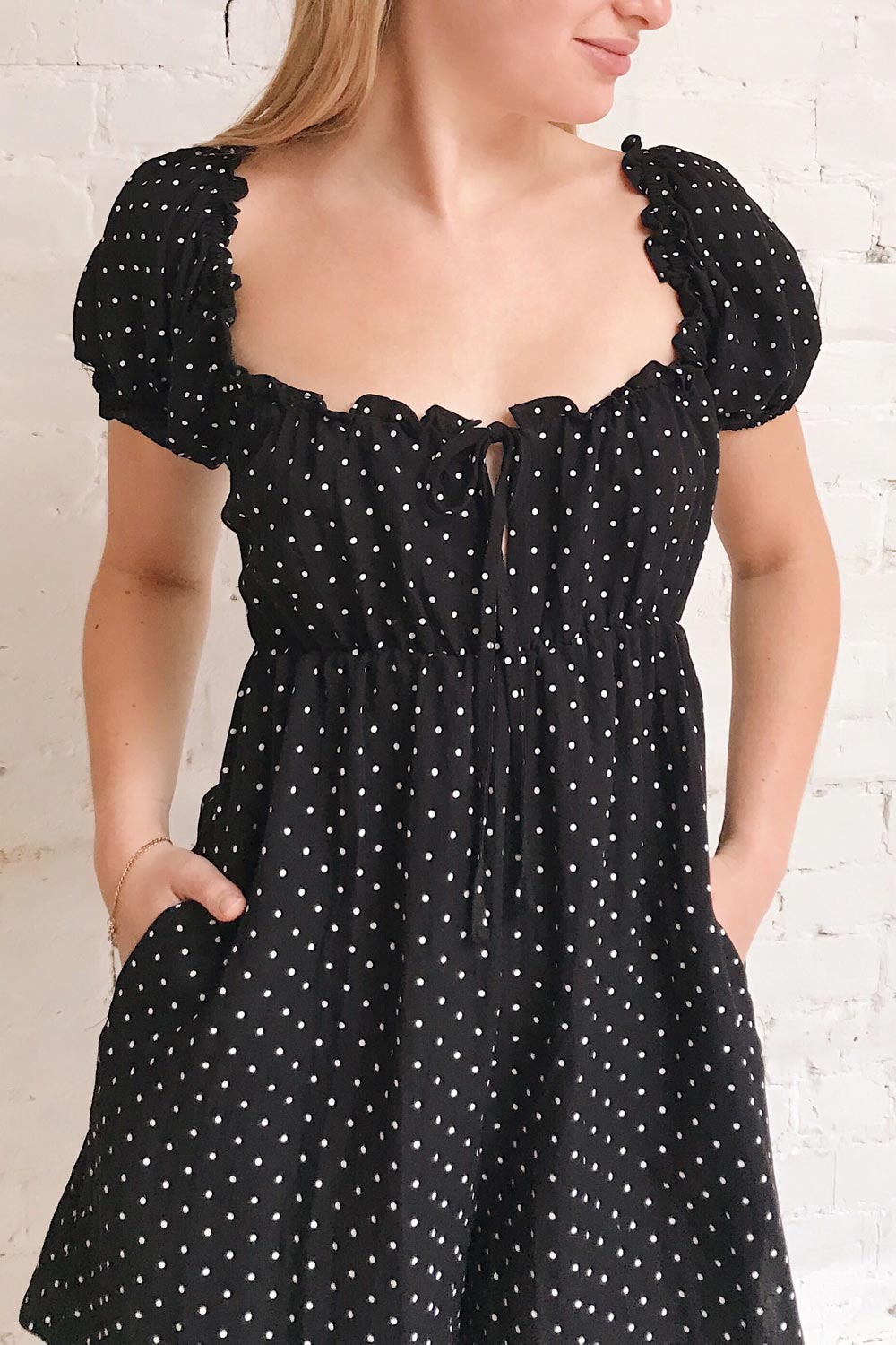 Rabka Black Polka Dot Short Sleeve Romper | La petite garçonne on model