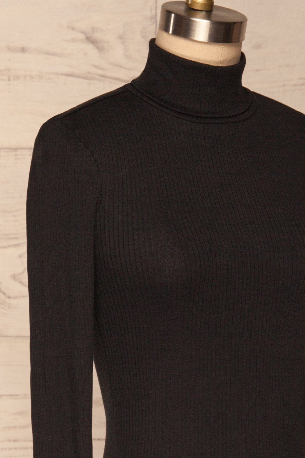 Roust Black Cotton Ribbed Turtleneck Top side close up | La Petite Garçonne