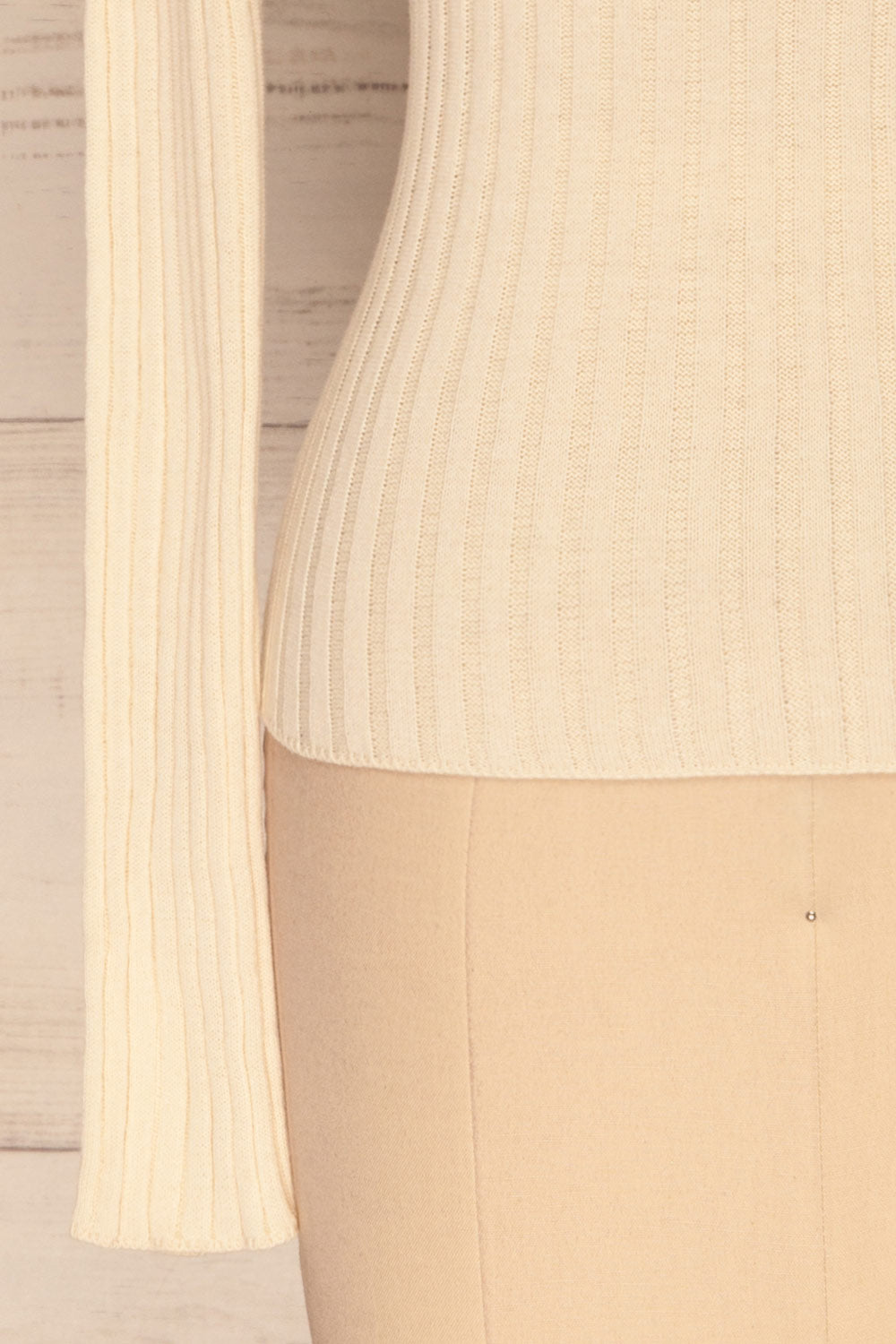 Tomsk Cream Turtleneck Top | Haut | La Petite Garçonne bottom close-up