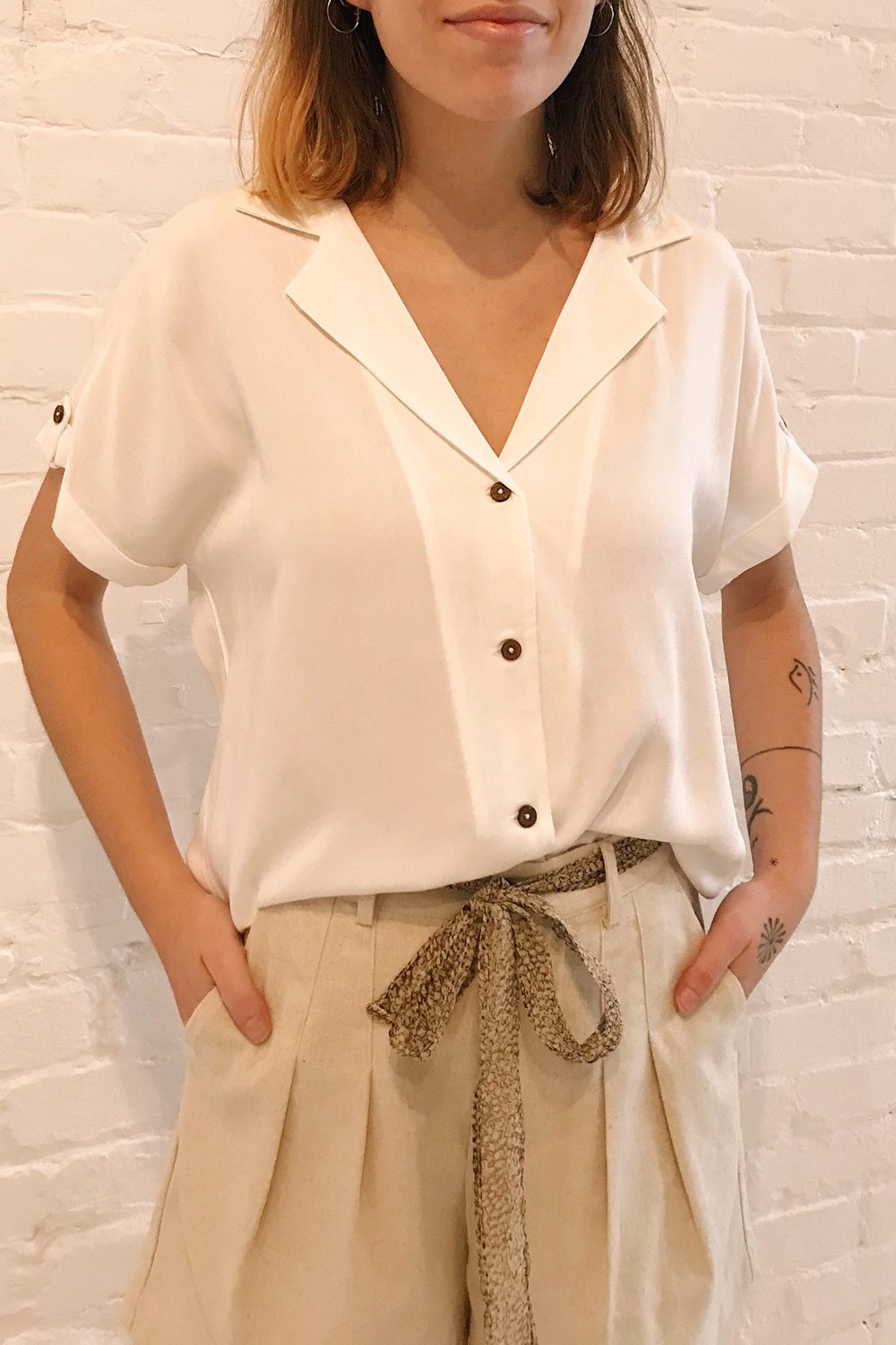 Buzau White Buttoned Short Sleeved Top | La petite garçonne on model
