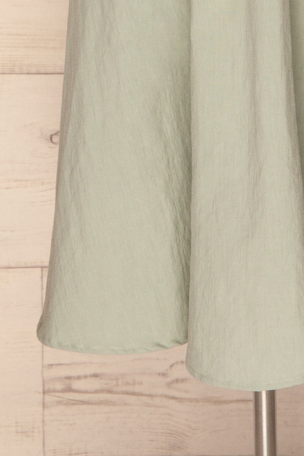 Valthi Blue Linen A-Line Midi Dress | La petite garçonne bottom close-up