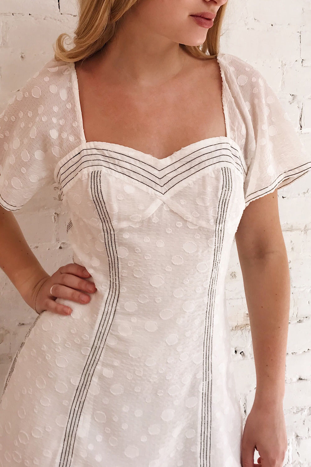 Ysoldine White Flared Cocktail Dress | Boutique 1861 on model