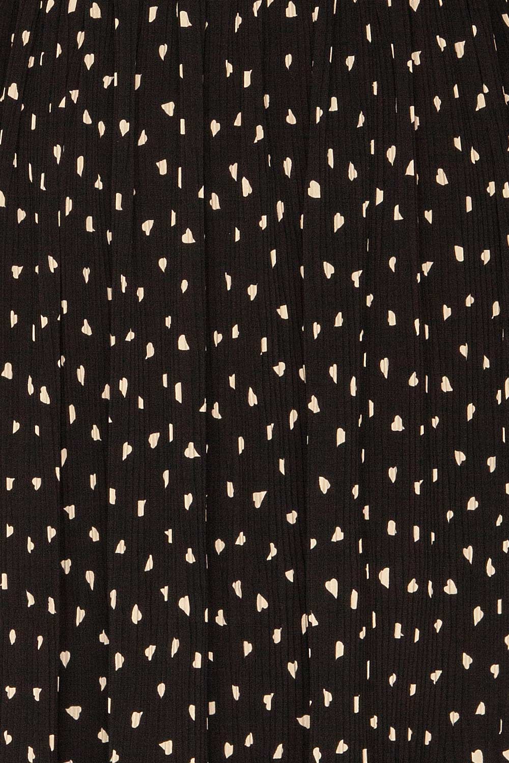 Yveline Black Pleated Midi Skirt | La petite garçonne fabric