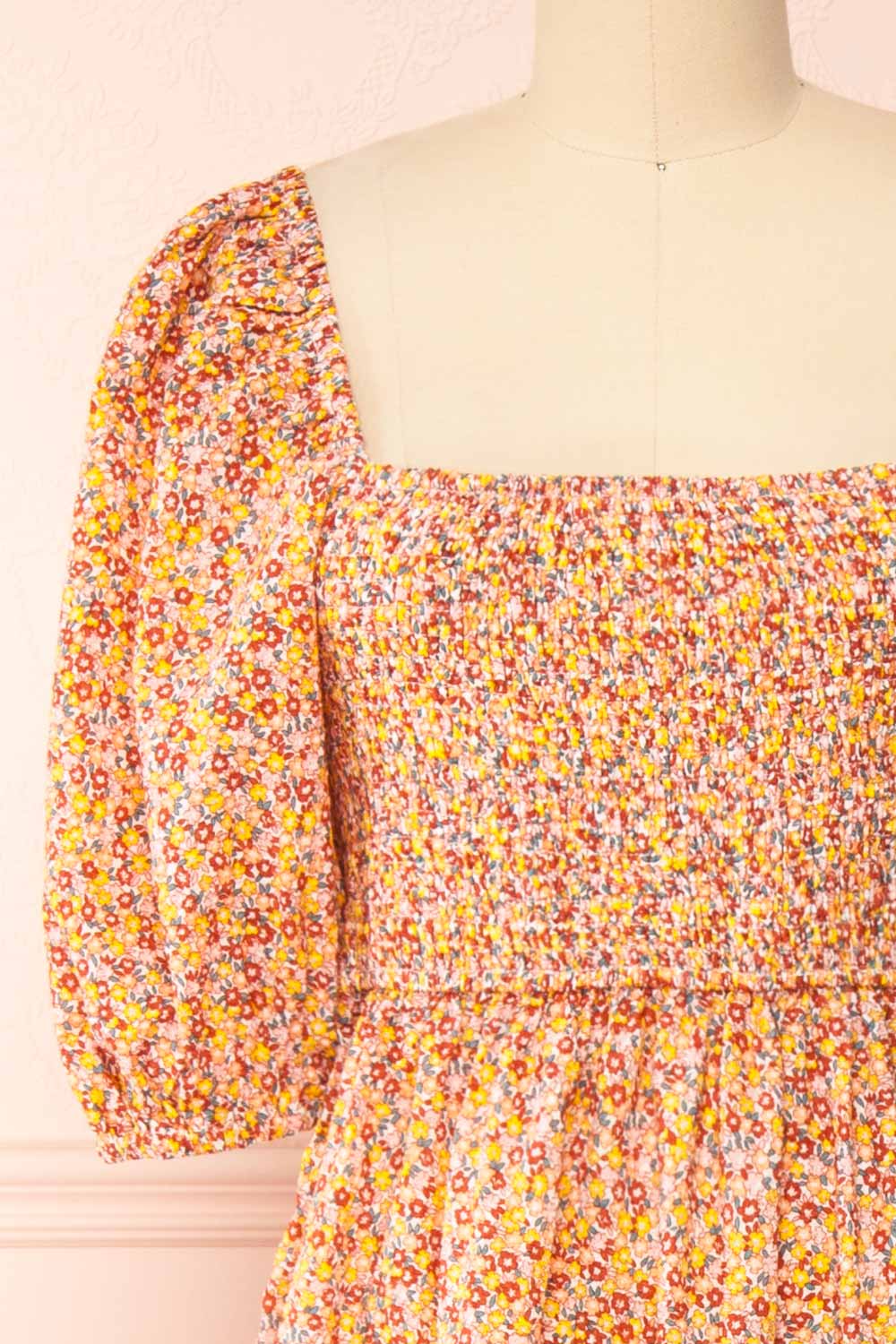 Candique Floral Midi Dress w/ Puffy Sleeves | Boutique 1861 front close-up