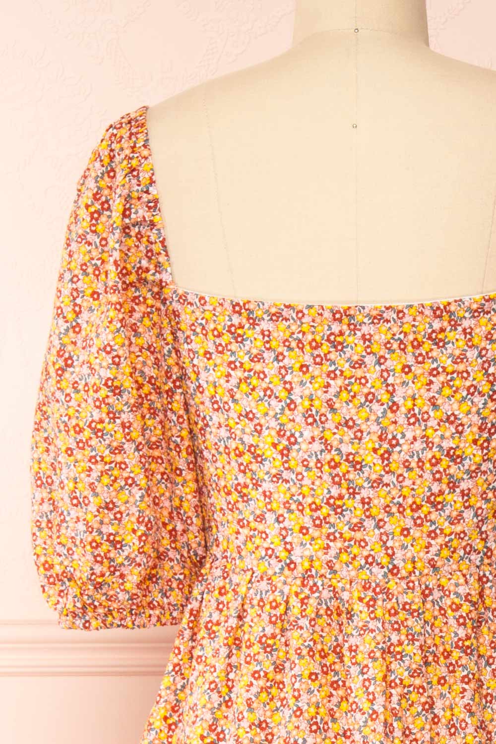 Candique Floral Midi Dress w/ Puffy Sleeves | Boutique 1861 back close-up