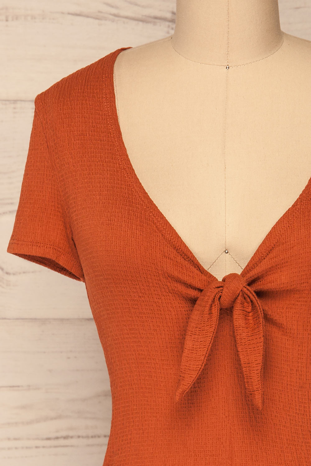 Cardiff Rust Orange V-Neck Knotted Top | La Petite Garçonne front close-up