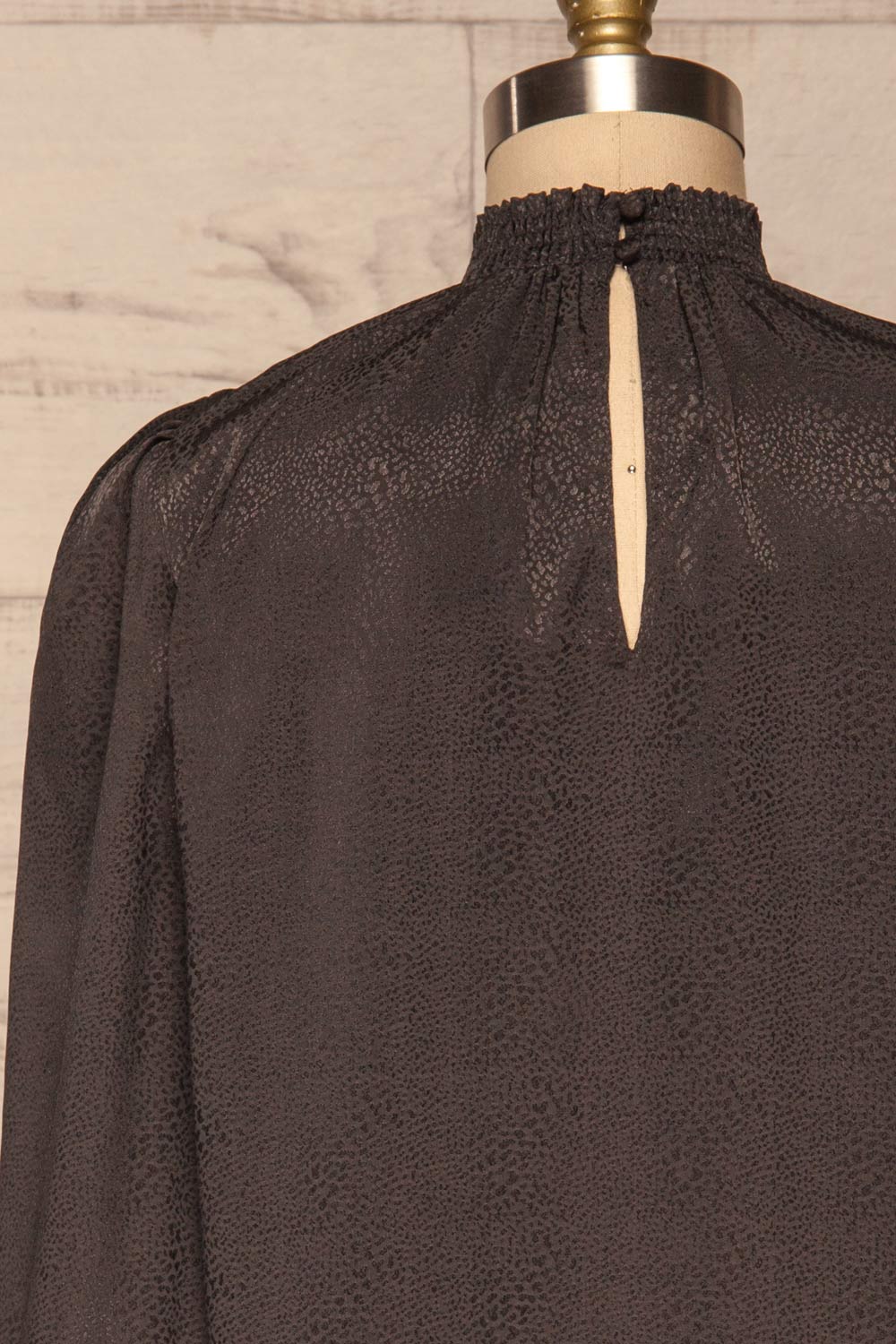 Corenne Dark Grey Satin Blouse | Haut back close up | La Petite Garçonne
