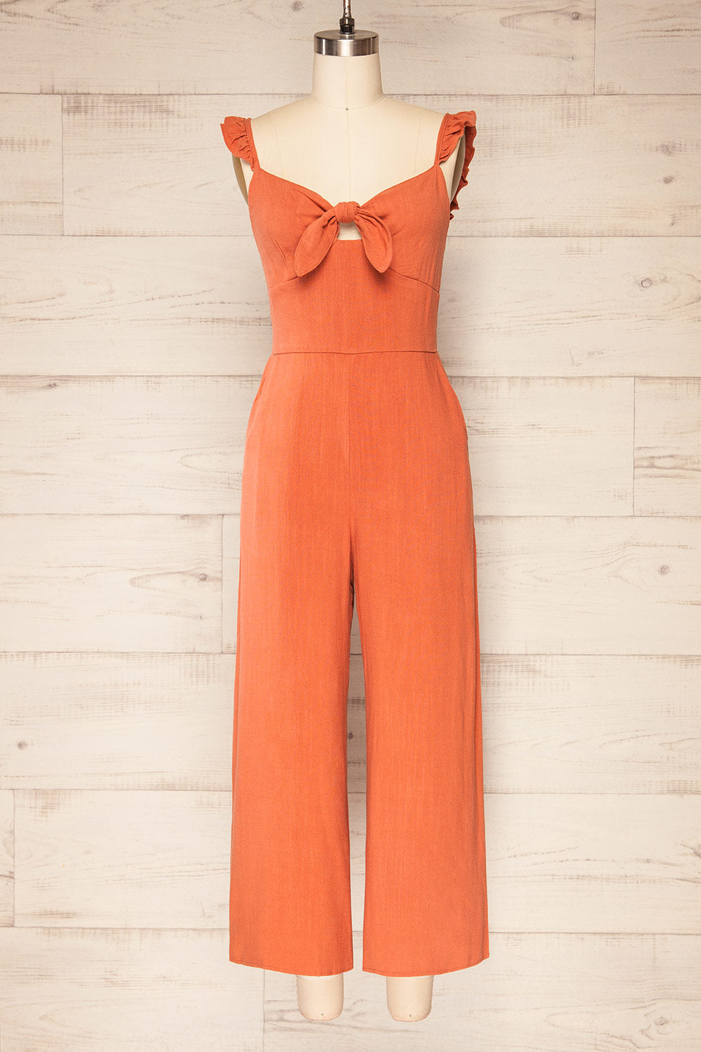 Crocevie Orange Jumpsuit with V-neckline | La petite garçonne front view