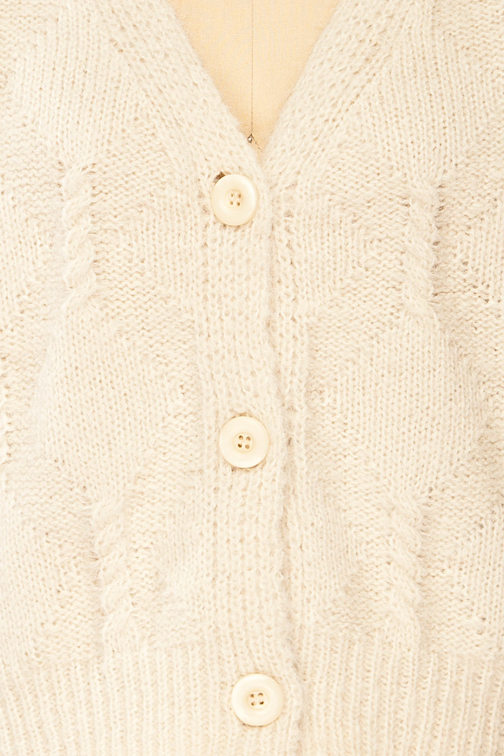 Eggje Ivory Button-Up Knit Cardigan | La petite garçonne fabric
