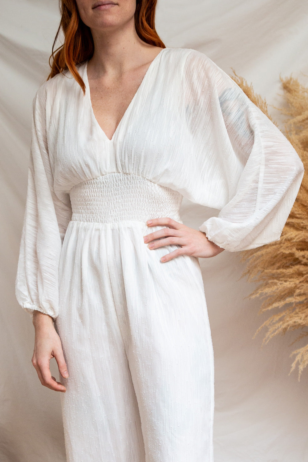 Falnes White V-Neck Wide Leg Jumpsuit | La petite garçonne model