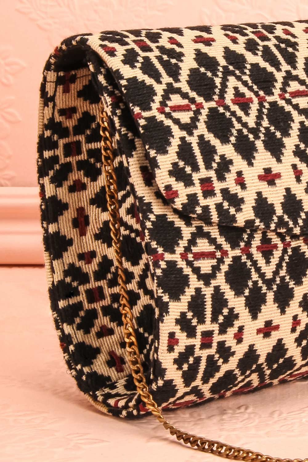 Forro - Black and beige embroidered clutch bag