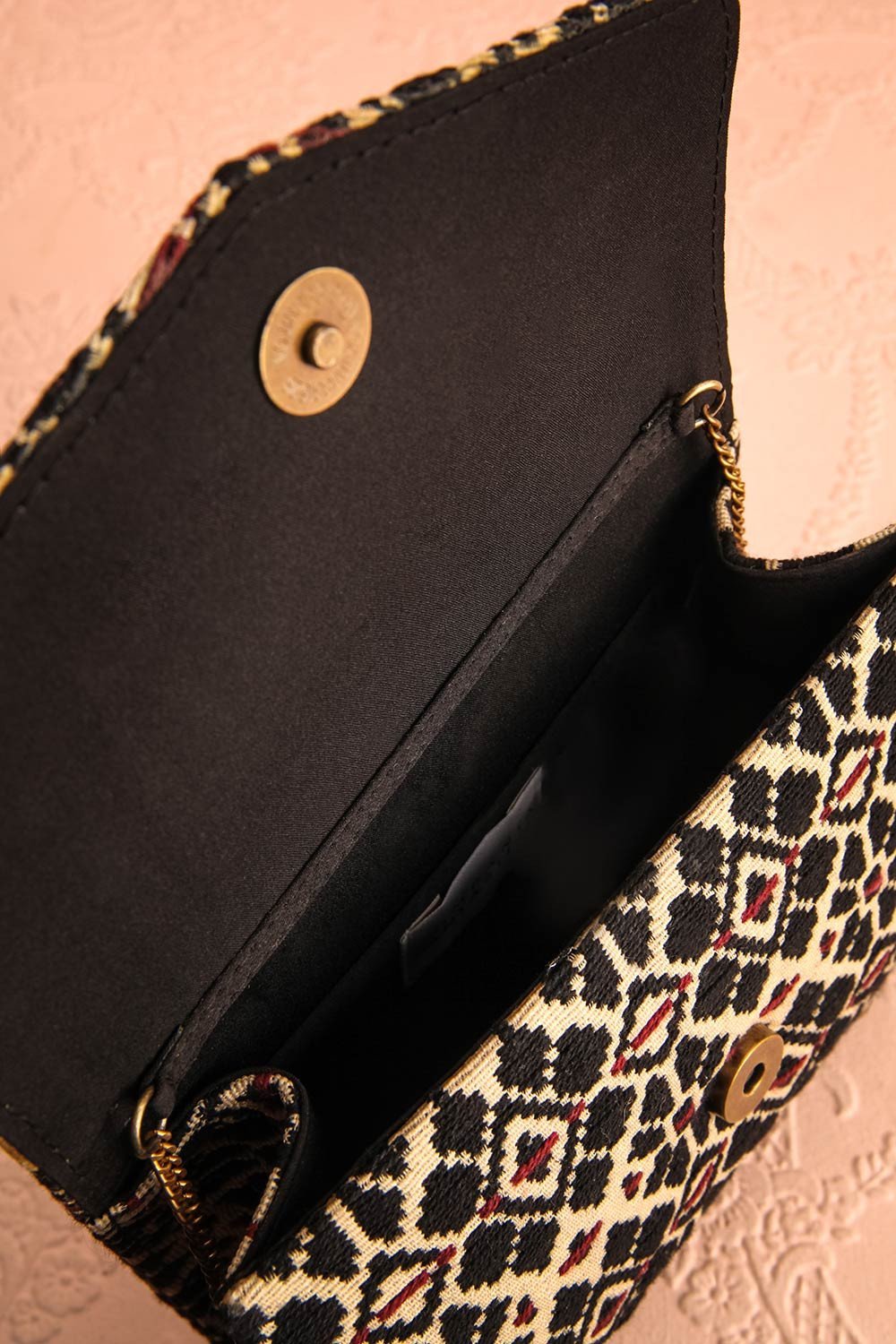 Forro - Black and beige embroidered clutch bag