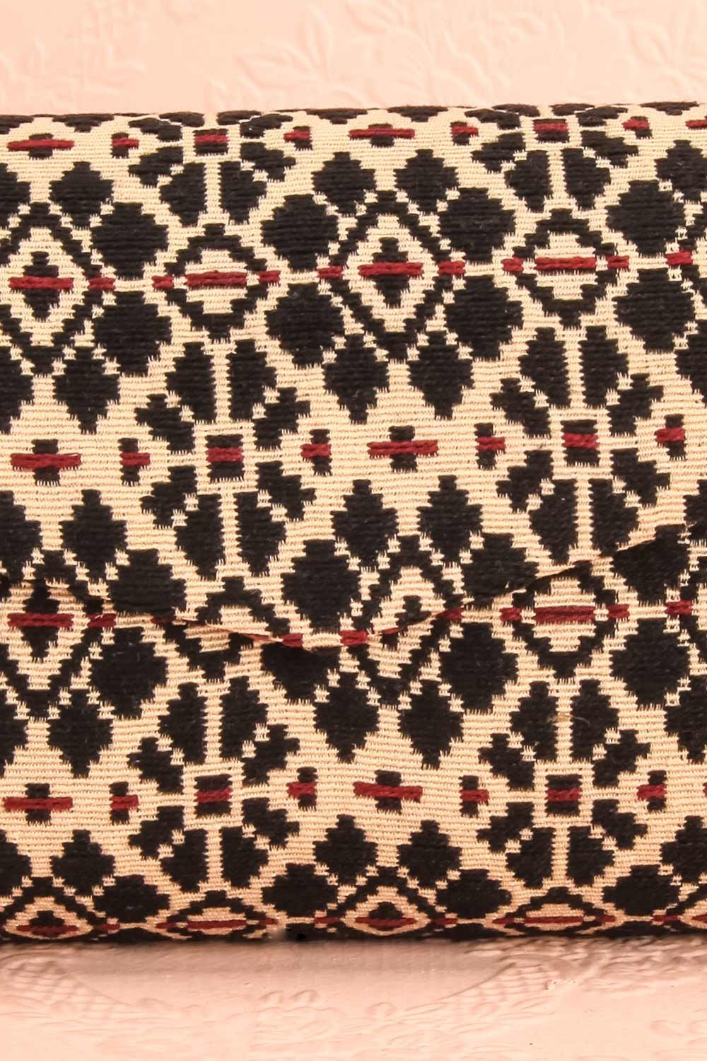 Forro - Black and beige embroidered clutch bag