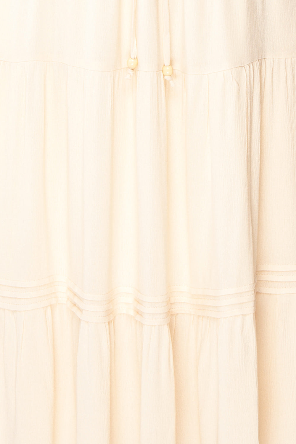 Grutille Beige Elastic Waist Layered Midi Skirt | Boutique 1861 fabric