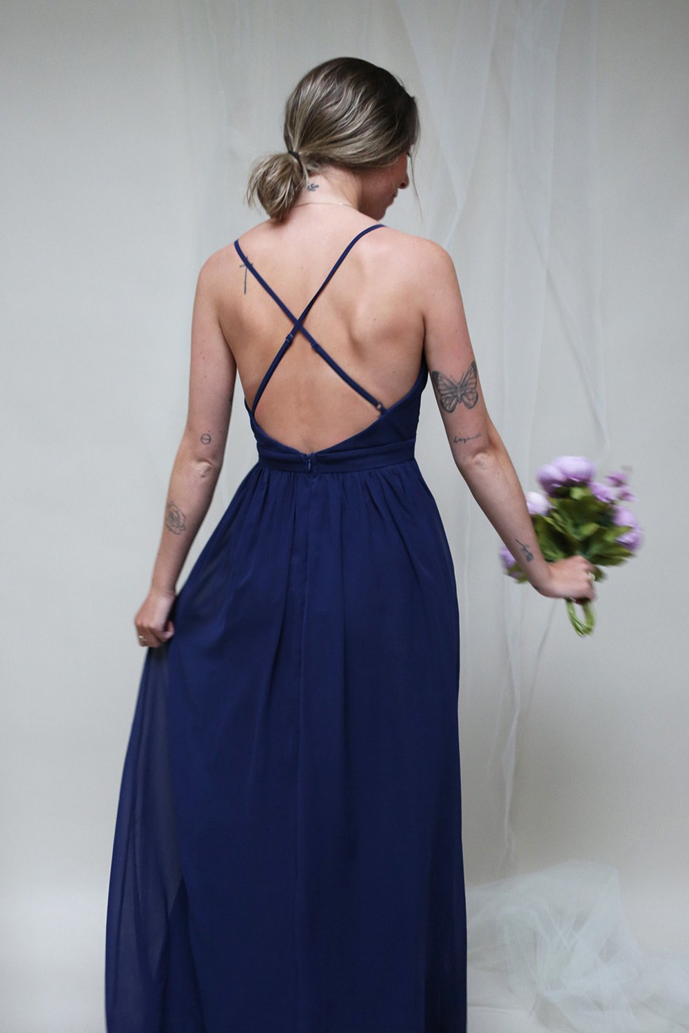 Haley Night Navy Gown with Plunging Neckline | Boutique 1861 on model