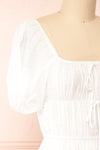 Imna White A-Line Midi Dress w/ Puffy Sleeves | Boutique 1861  side close-up