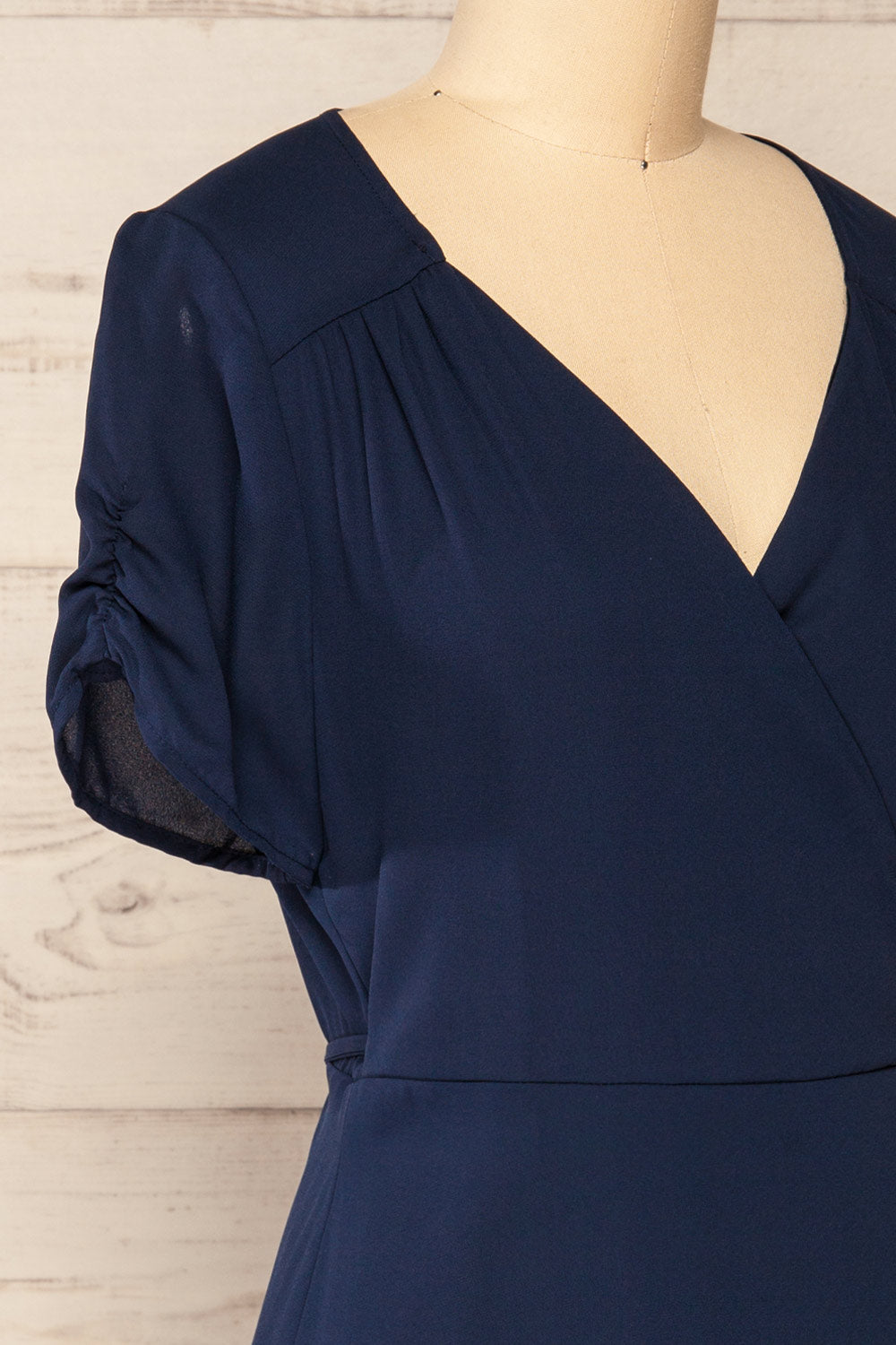 Jaurel Navy Short Sleeve Wrap Dress | La petite garçonne side close-up