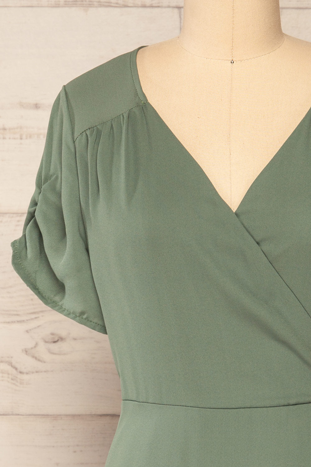 Jaurel Sage Short Sleeve Wrap Dress | La petite garçonne front close-up