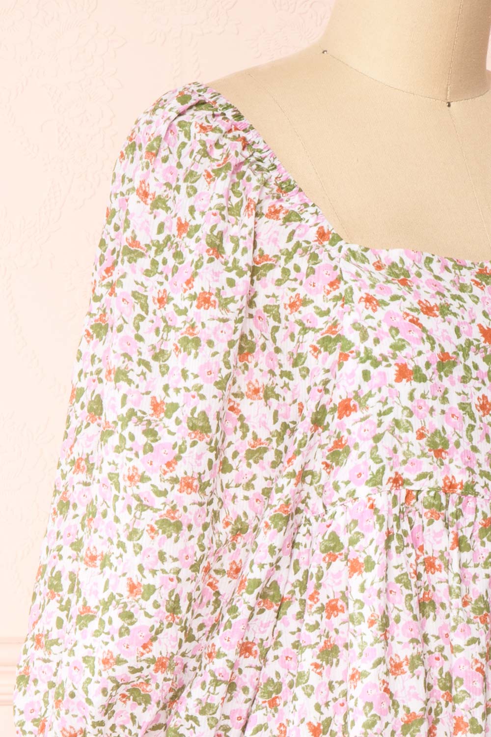 Kalla Pink Floral Short Dress w/ 3/4 Puffy Sleeves | Boutique 1861 side close-up