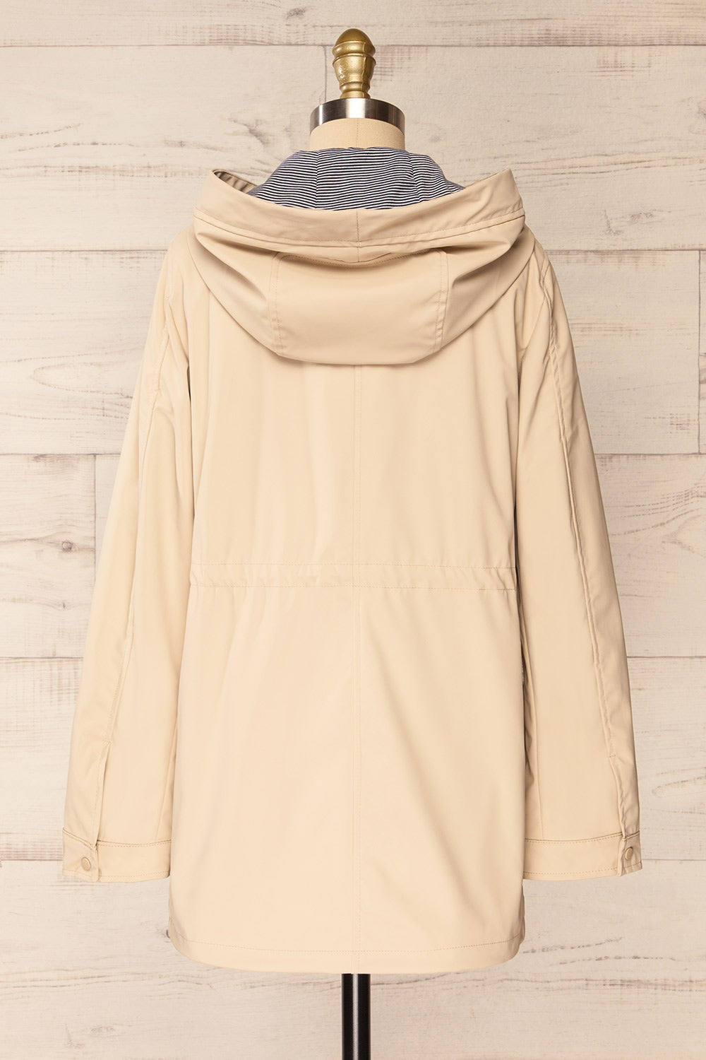 Kharokopion Beige Hooded Raincoat w/ Drawstring | La petite garçonne back view