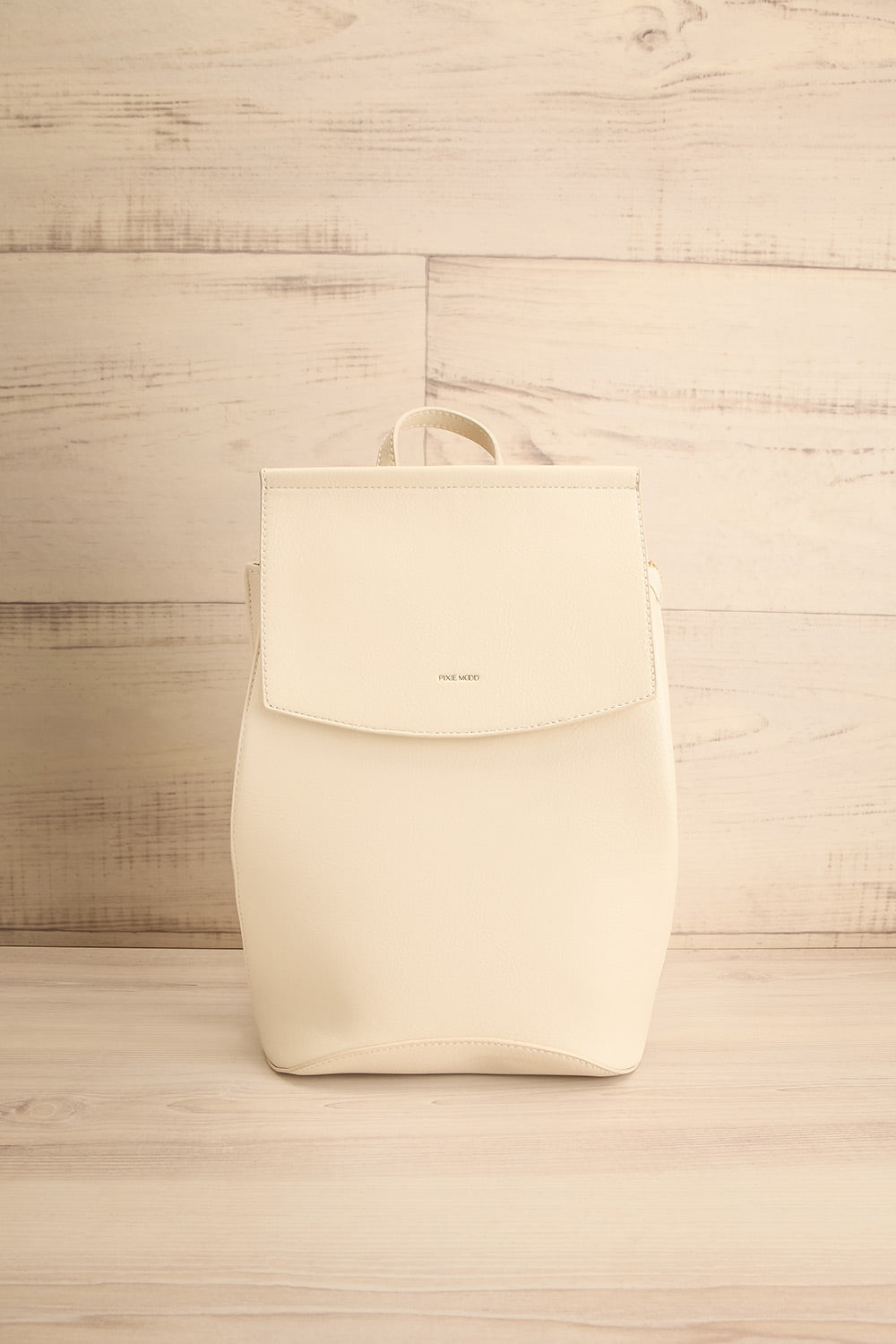 Laucala Ivory Faux-Leather Backpack | La petite garçonne front view