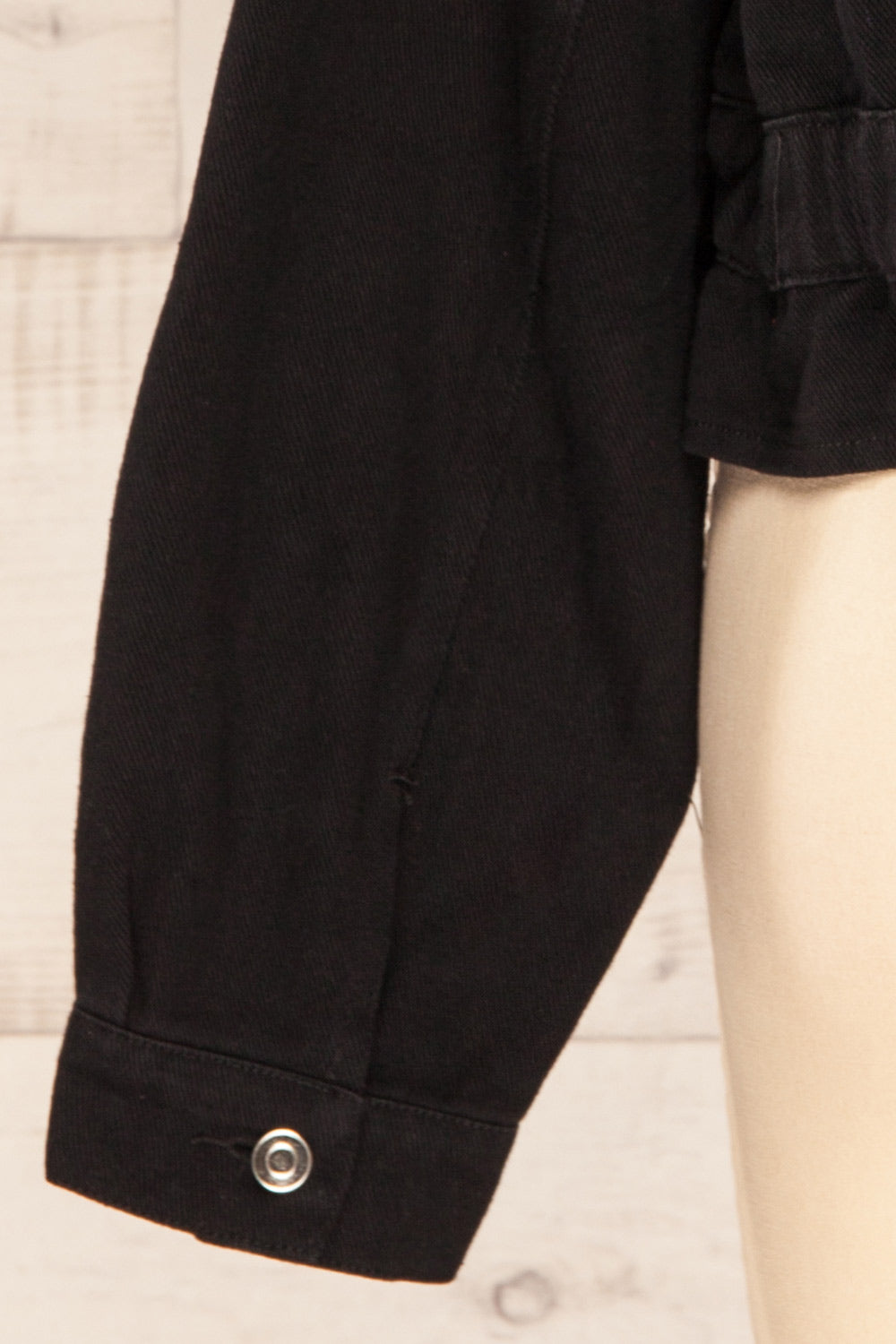 Luokta Black Cropped Jean Jacket | La petite garçonne back sleeve close-up