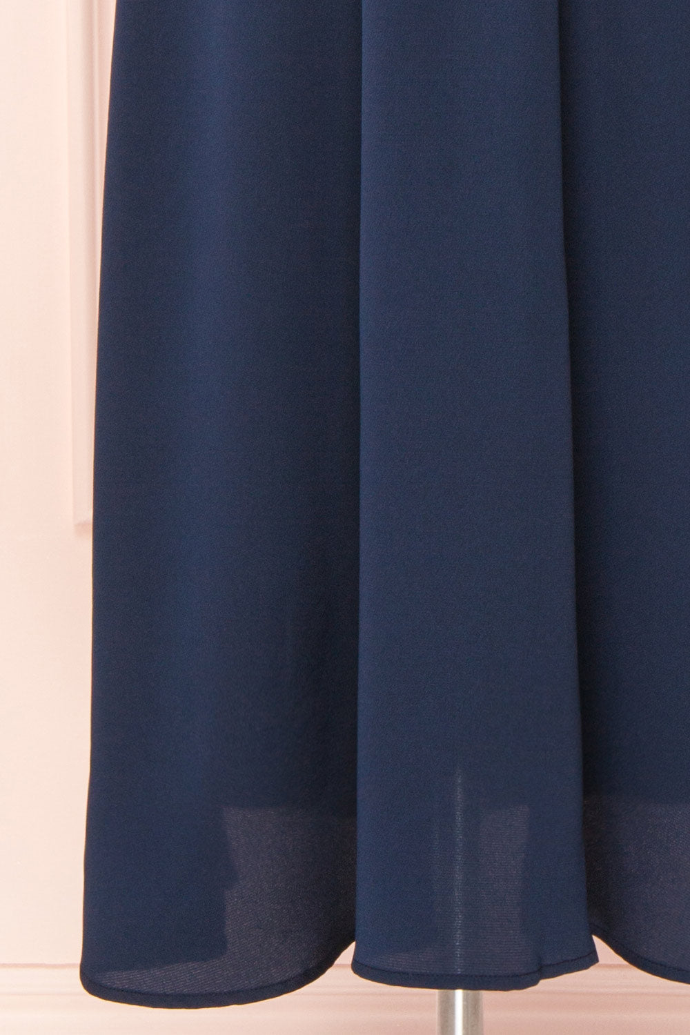 Mariela Navy Mock Neck Silky Midi Dress | Boutique 1861 bottom close-up