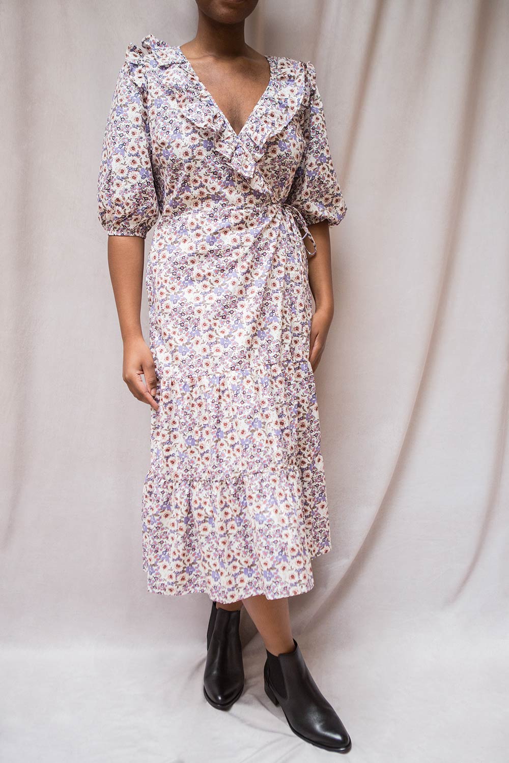 Myane Floral Wrap Midi Dress w/ Puff Sleeves | Boutique 1861 on model