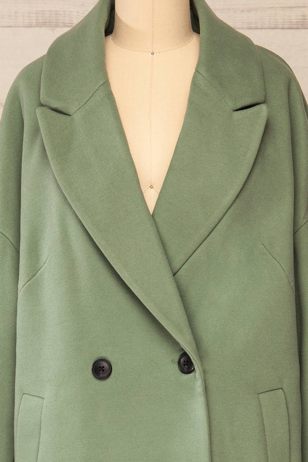 Nahaven Sage Buttoned Trench Coat | La petite garçonne front close-up