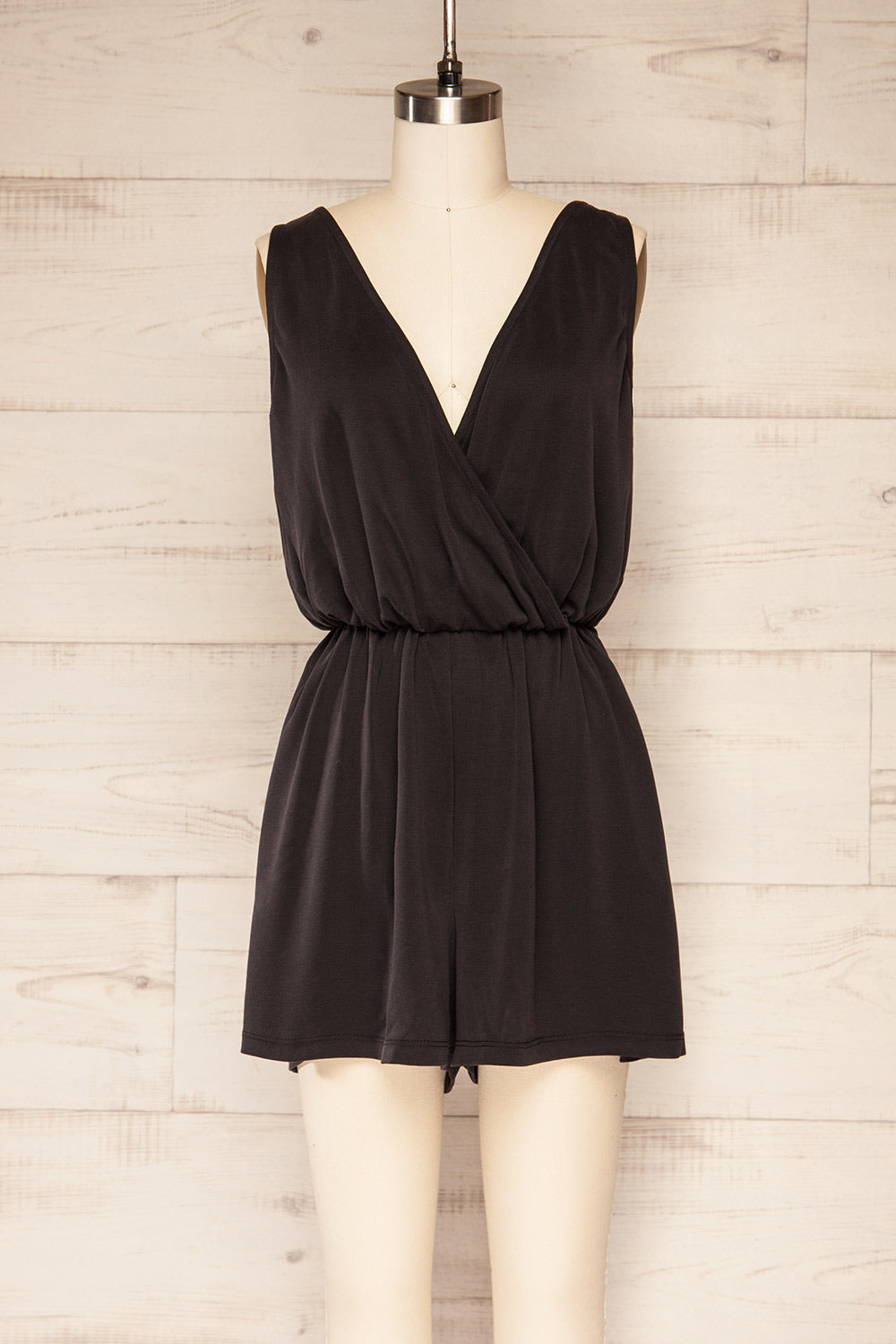 Opoczno Black Sleeveless Plunging Neckline Romper | La petite garçonne front view