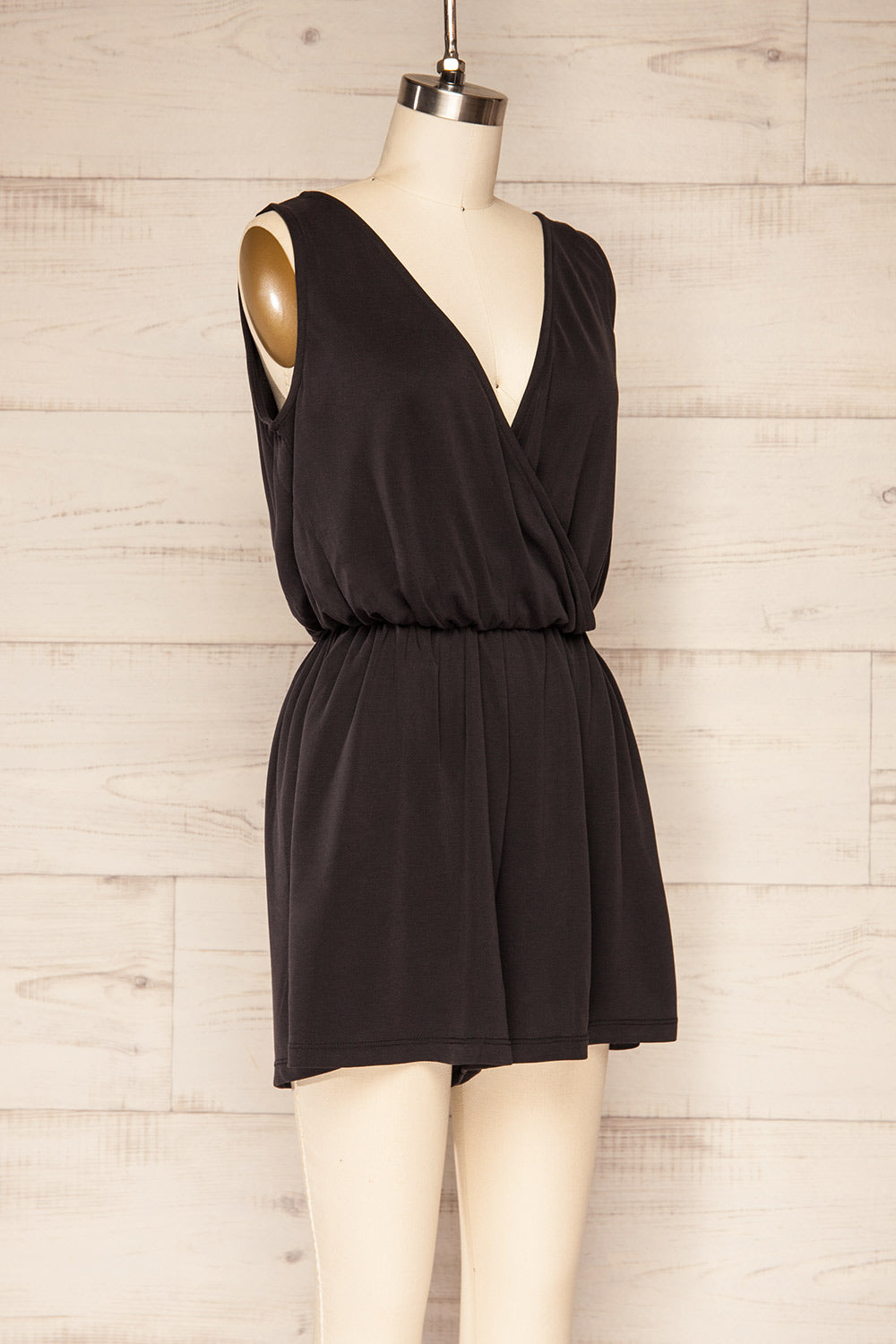 Opoczno Black Sleeveless Plunging Neckline Romper | La petite garçonne side view