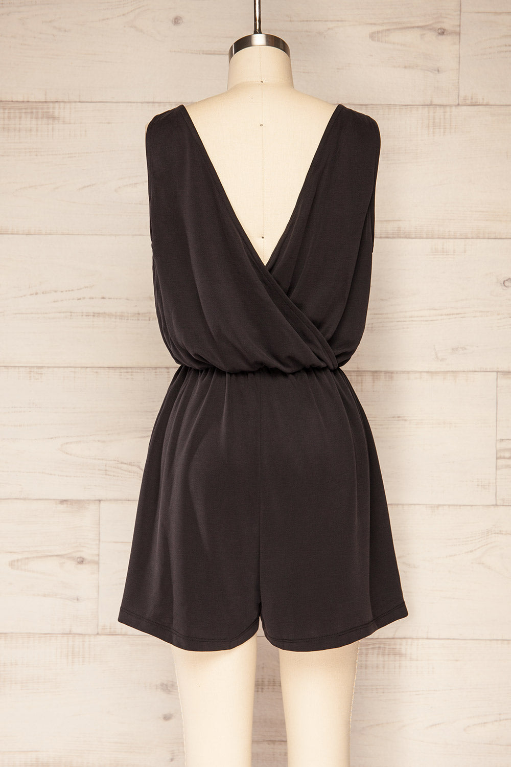 Opoczno Black Sleeveless Plunging Neckline Romper | La petite garçonne back view