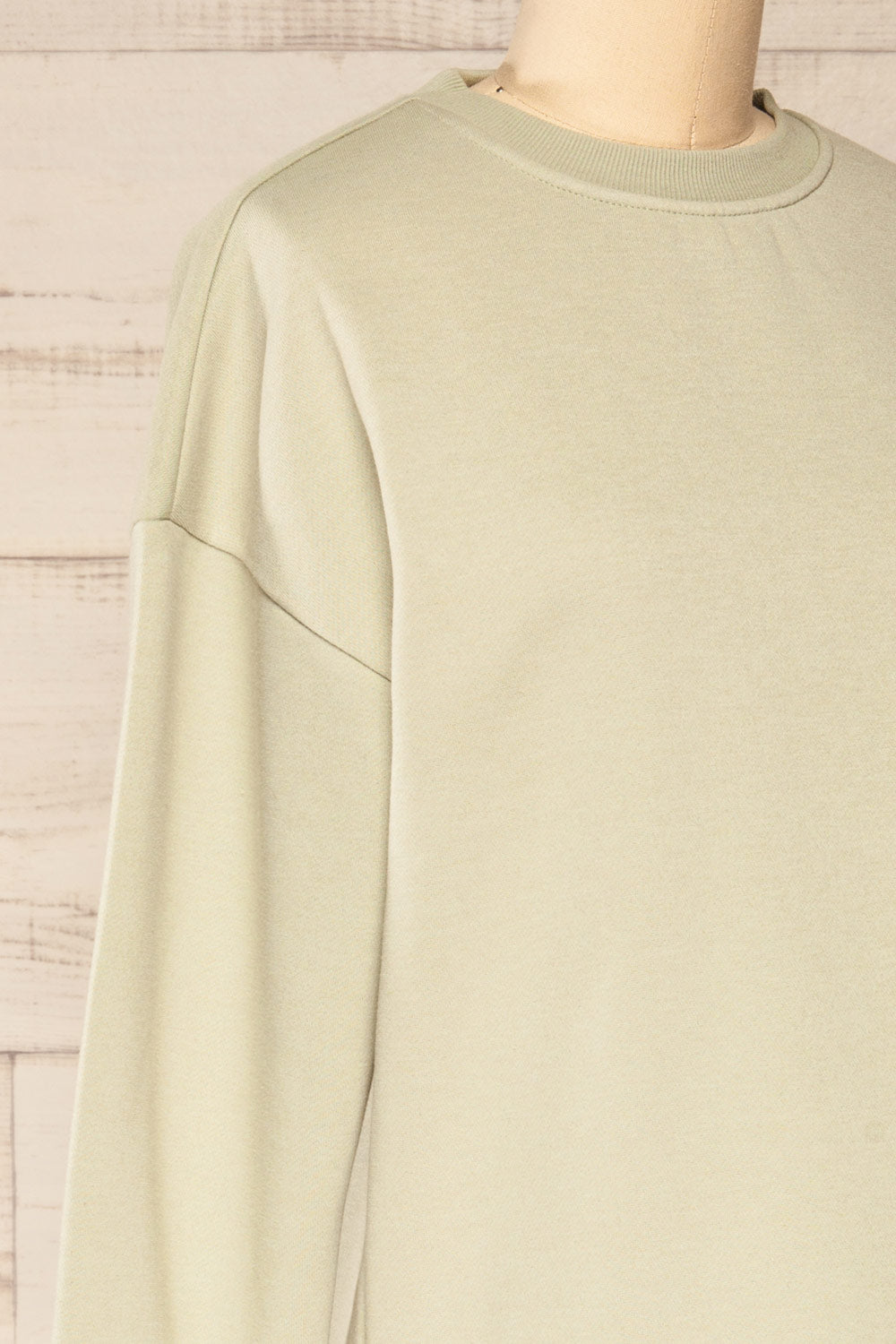 Orhei Sage Oversized Sweatshirt Dress | La petite garçonne side close-up