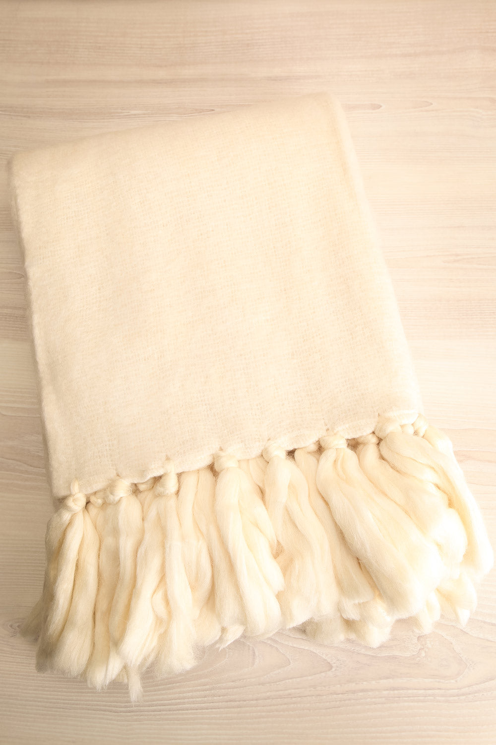 Oslo Throw Ivory | La petite garçonne folded