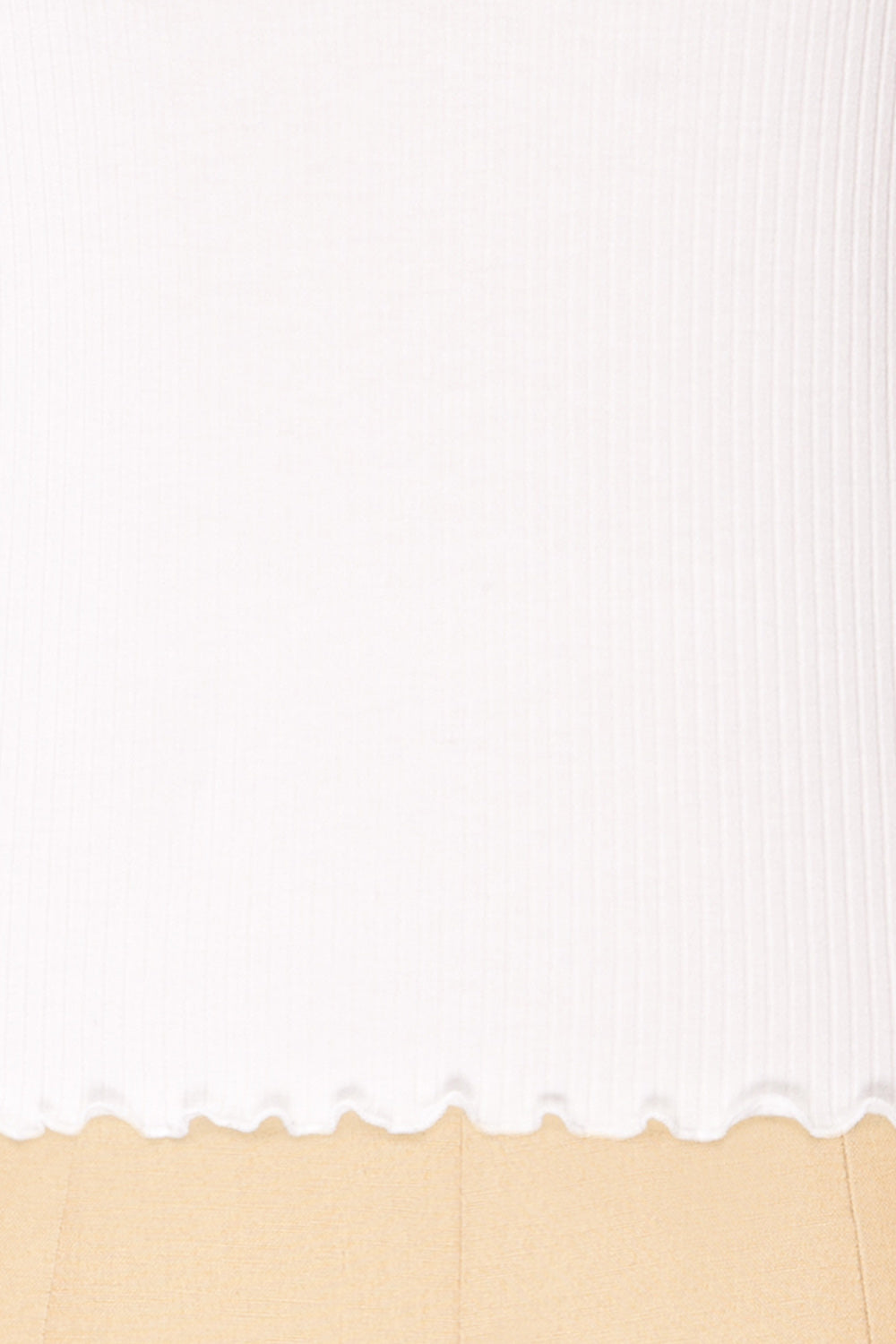 Palencia White Ribbed Long Sleeve Top w/ Frills| La petite garçonne fabric