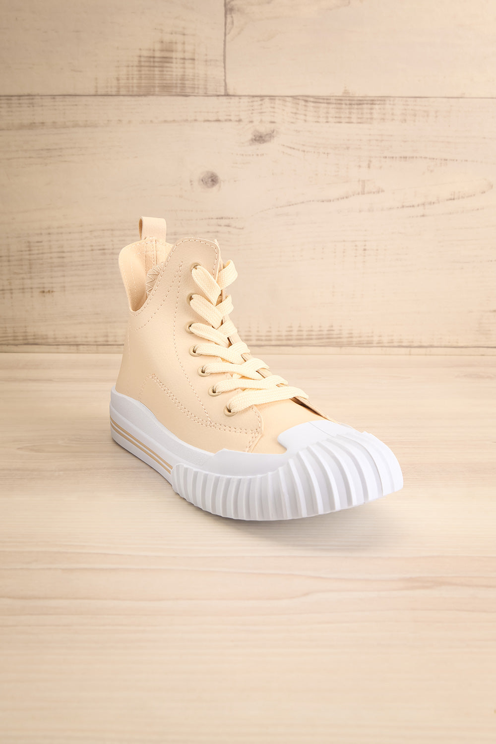 Portefoin Beige High Top Sneakers | La petite garçonne front view