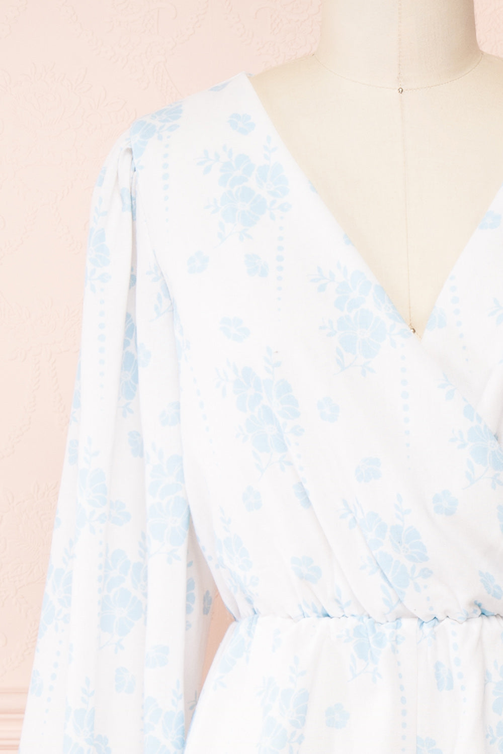 Precious Short Floral Romper w/ Long Sleeves | Boutique 1861 front close-up