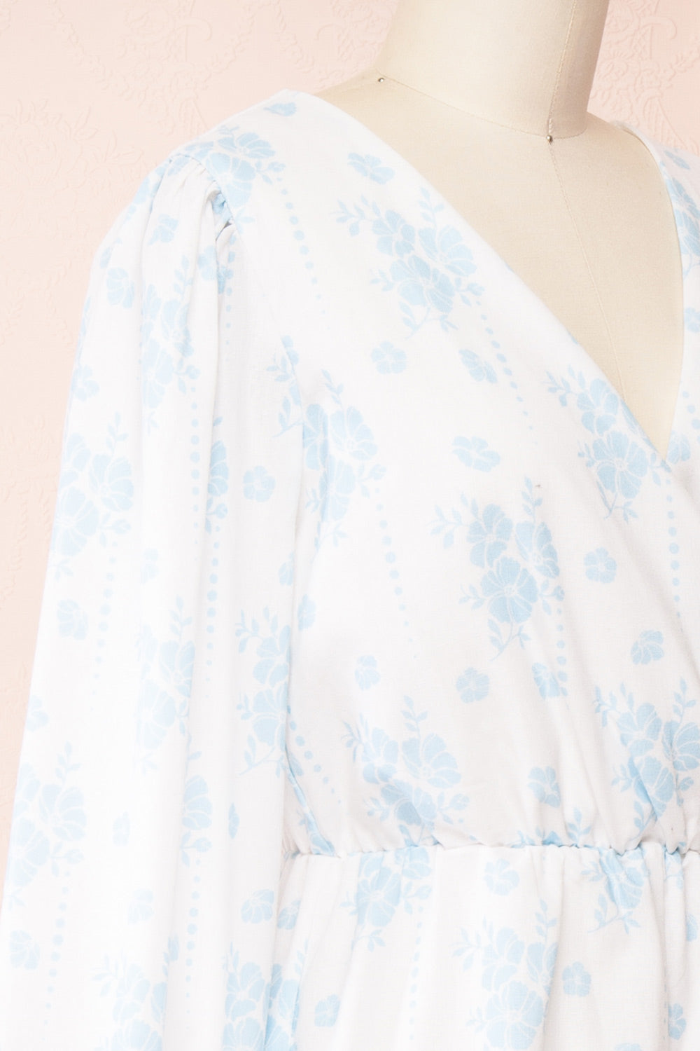 Precious Short Floral Romper w/ Long Sleeves | Boutique 1861 side close-up