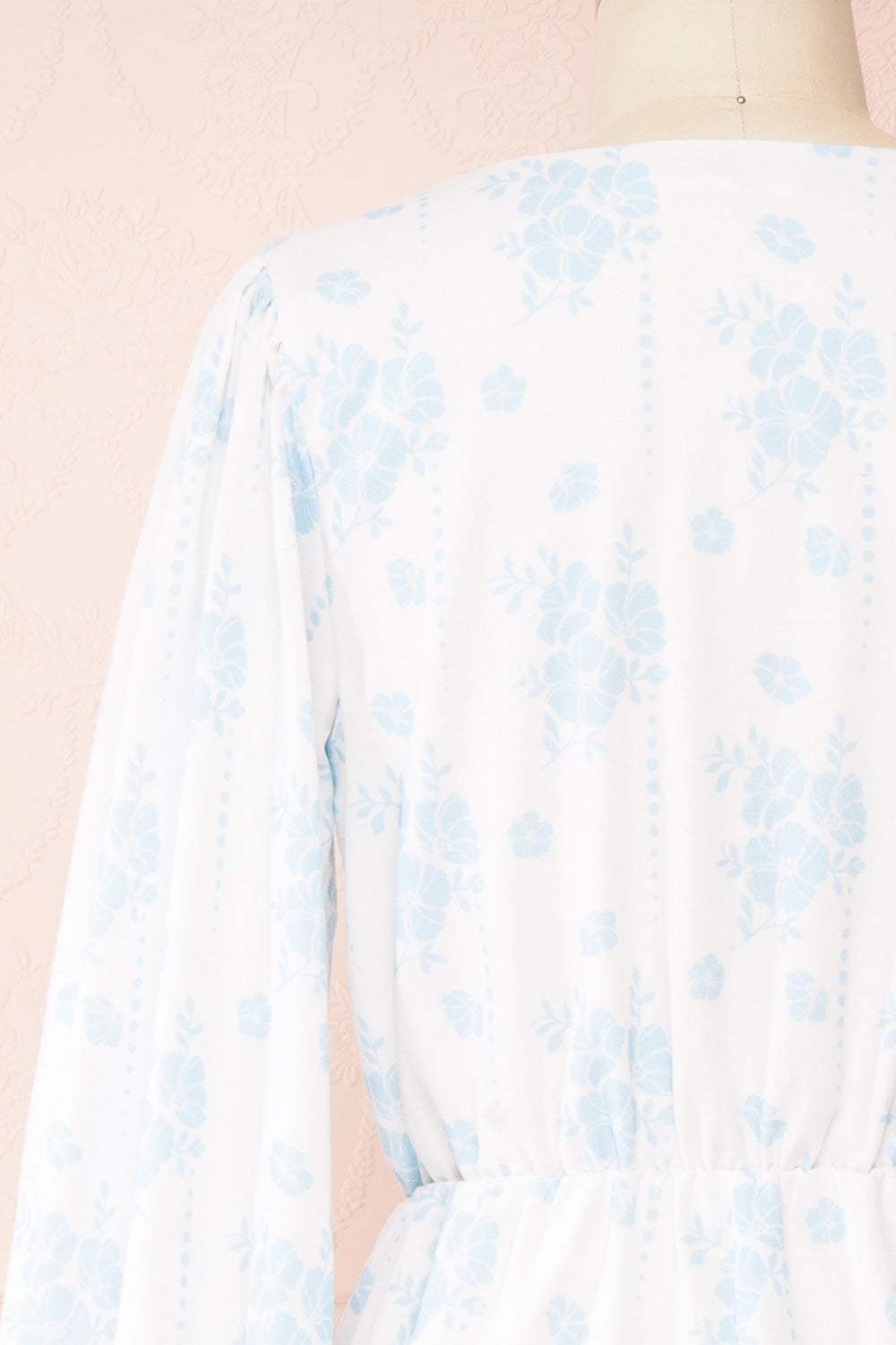 Precious Short Floral Romper w/ Long Sleeves | Boutique 1861 back close-up