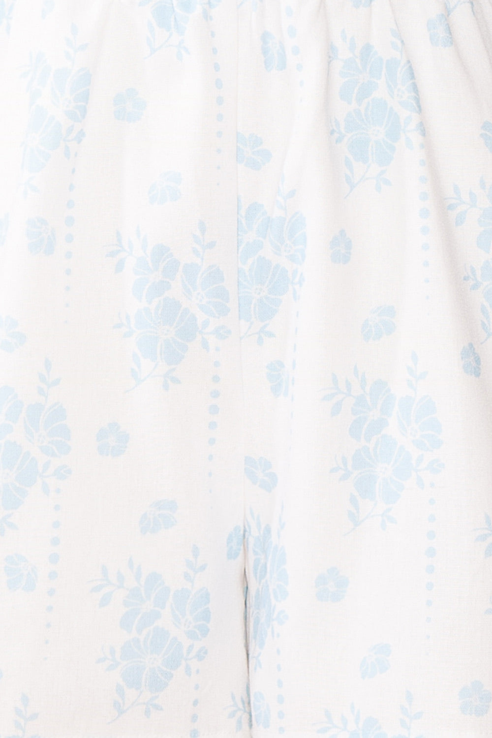 Precious Short Floral Romper w/ Long Sleeves | Boutique 1861 fabric