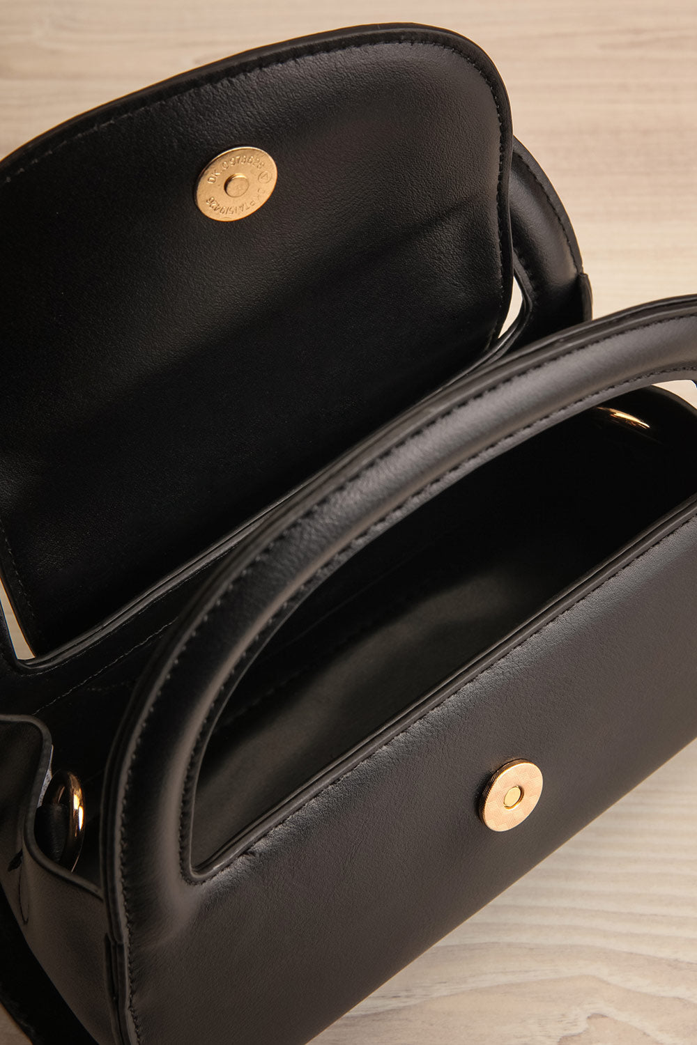 Scorpius Noir Small Handbag | La petite garçonne inside