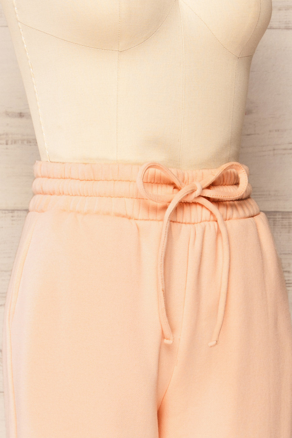 Set Luqa Peach Sweater & Joggers | La petite garçonne side close-up