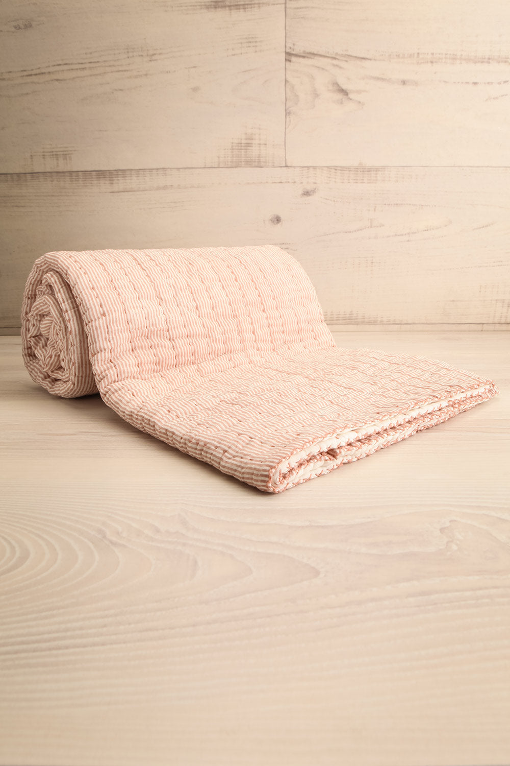 Tegue Blush Quilted Throw Blanket | La petite garçonne rolled