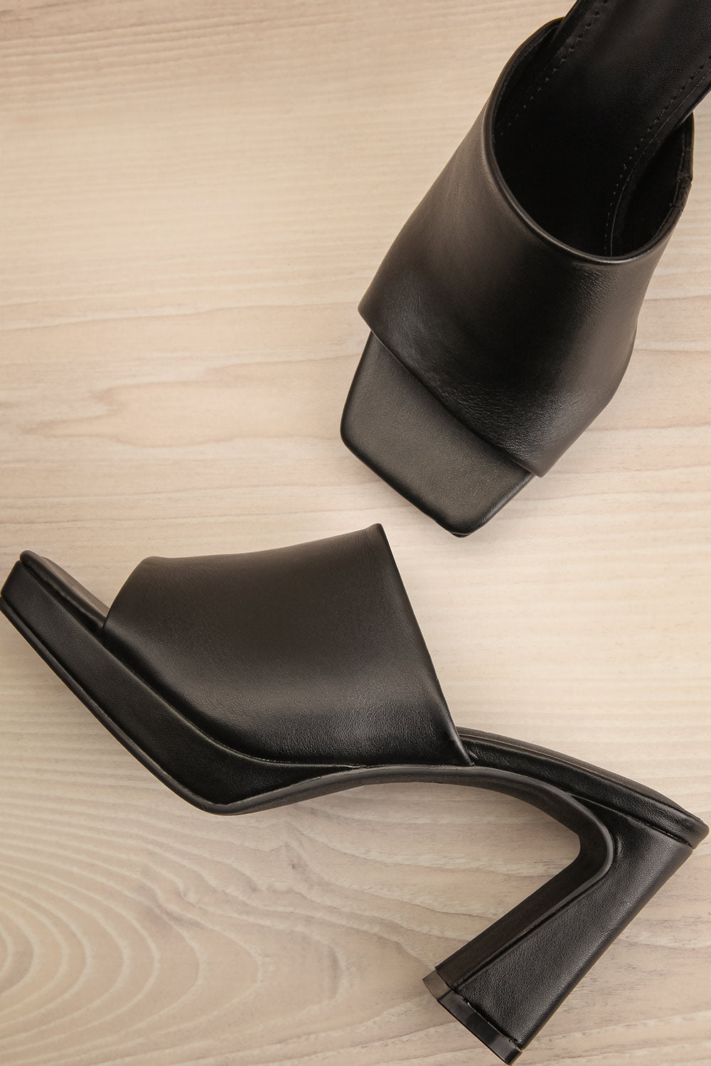 Tucana Black Heeled Mules | La petite garçonne flat view
